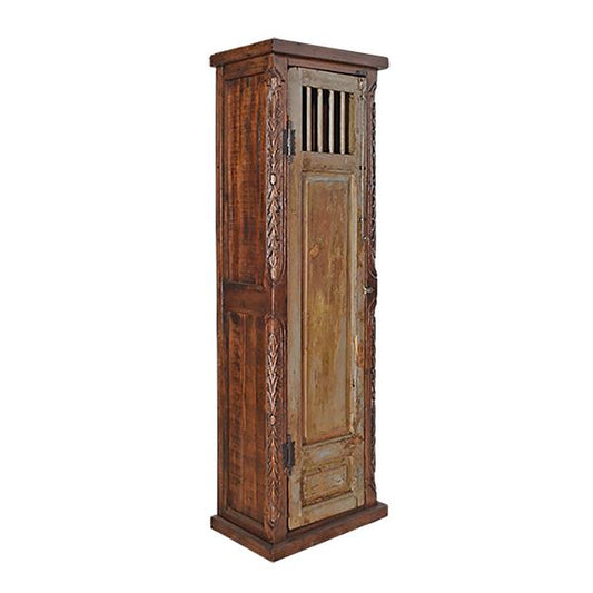 A tall, narrow rustic wooden cabinet with carved details and a distressed finish, shown against a plain white background.