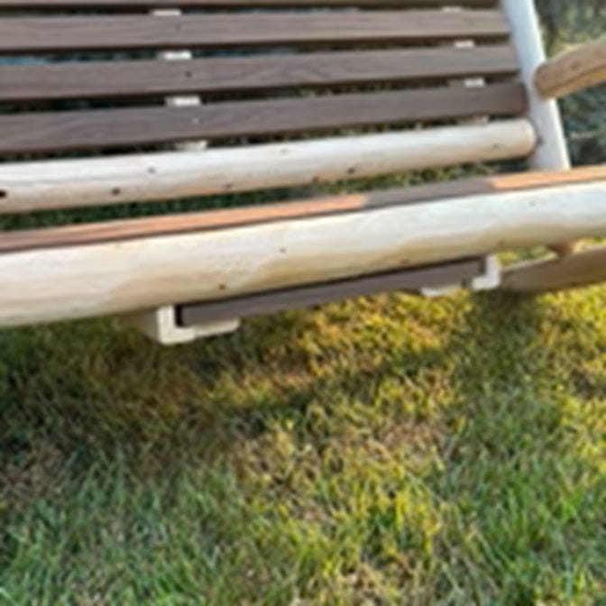 Wooden bench on grass
