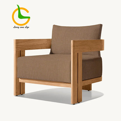 Brown armchair with wooden frame on a white background, featuring a logo in the corner.