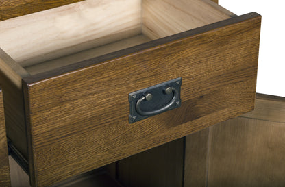 Close-up of a wooden drawer with a medium brown finish, an open light wood interior, and a dark metal pull handle.