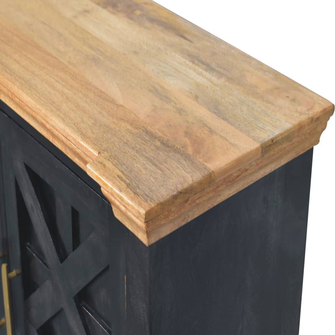 Wooden countertop on a black metal cabinet with decorative cutout design.
