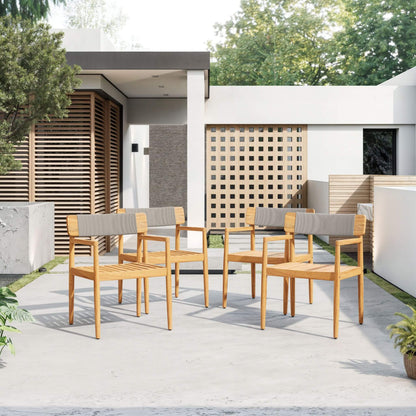 Outdoor patio set with wooden chairs and gray cushions in a modern backyard setting.