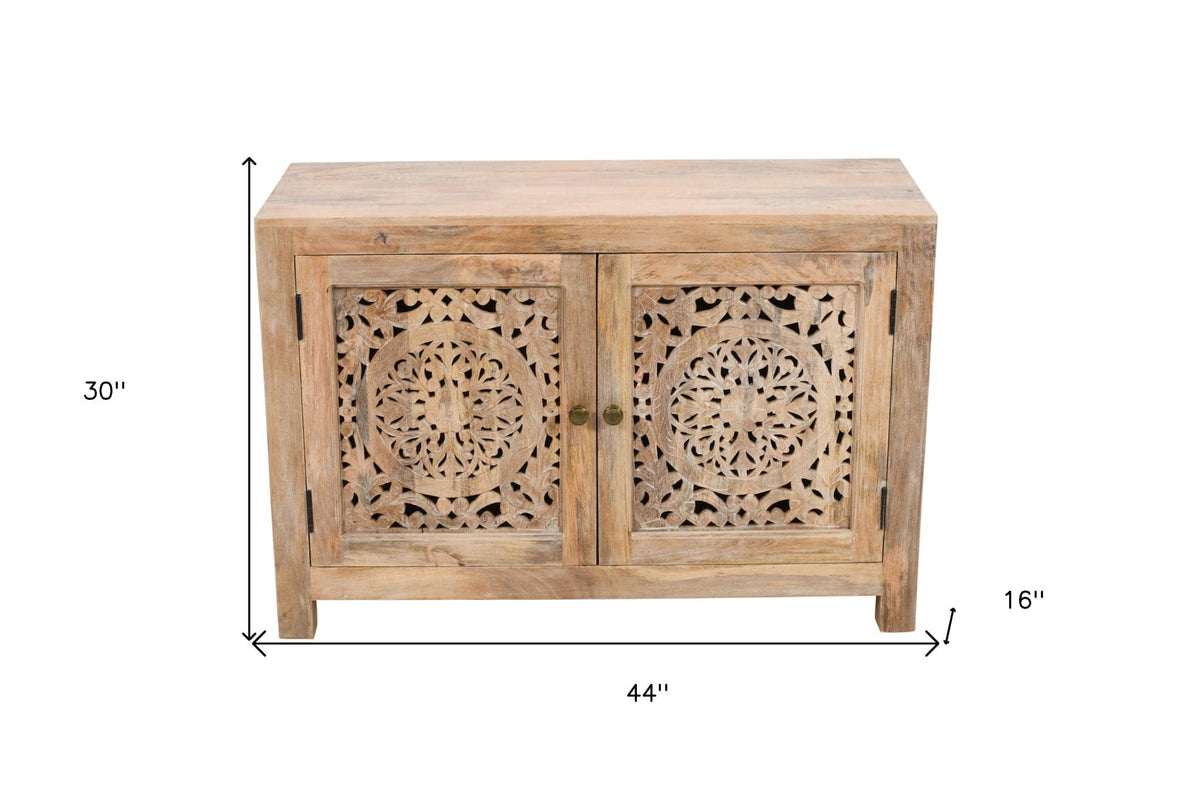 A light brown wooden side cabinet with two doors featuring intricate circular cutout carvings, shown with dimension lines indicating 30 inches tall, 44 inches wide, and 16 inches deep on a white background.