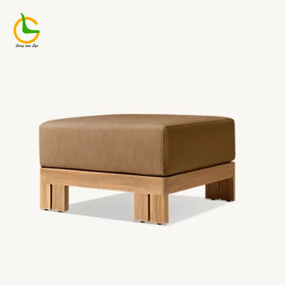 Brown cushioned ottoman with wooden frame on a white background