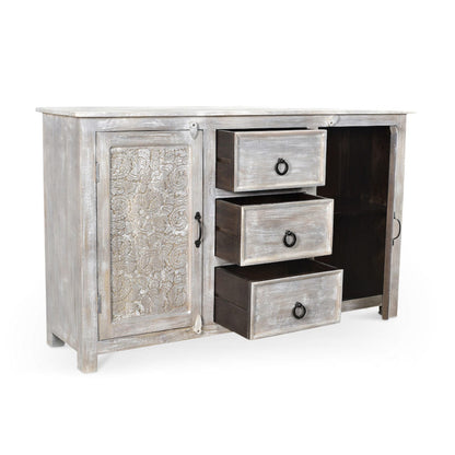 Wooden sideboard with textured door and three drawers on a white background