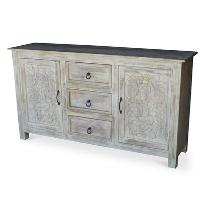 Wooden sideboard with floral carvings on a white background