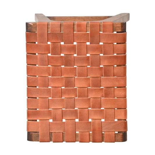 Woven brown basket on a white background