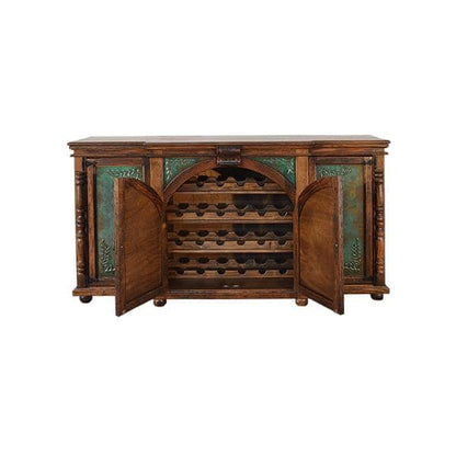 A rustic wooden wine cabinet with two doors swung open, revealing wine bottle racks inside and decorative green panels on the sides, shown against a plain white background.
