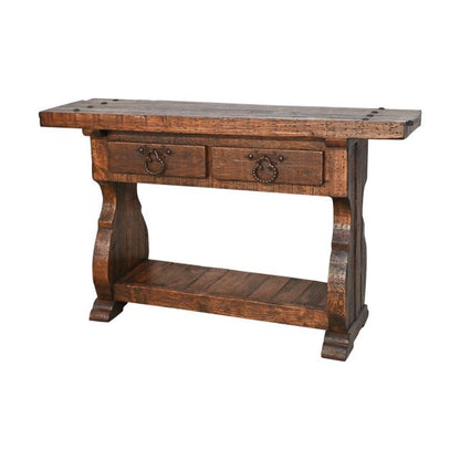 A rustic brown wooden console table with two drawers featuring dark metal ring pulls, a lower shelf, and turned legs, shown against a plain white background.