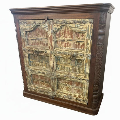 Decorative wooden cabinet with bookshelf design on a white background