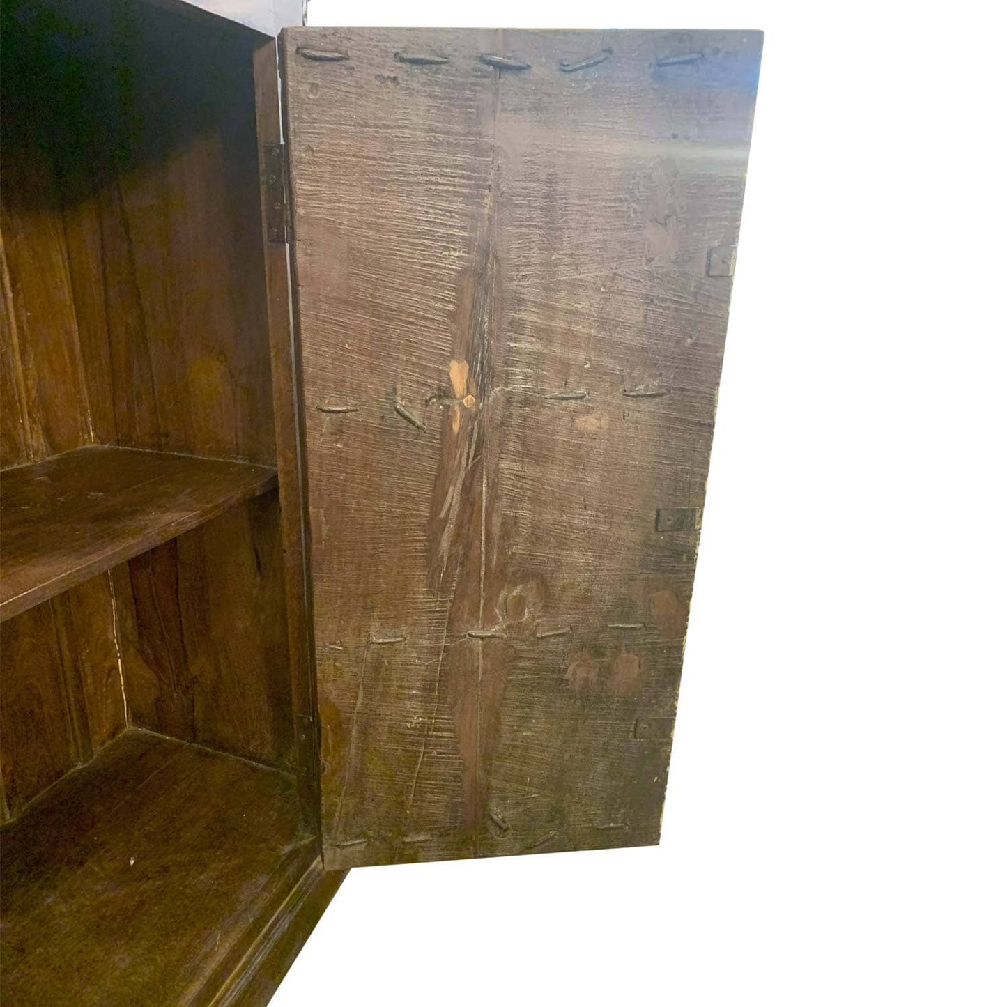 Wooden wardrobe with a single door open on a white background