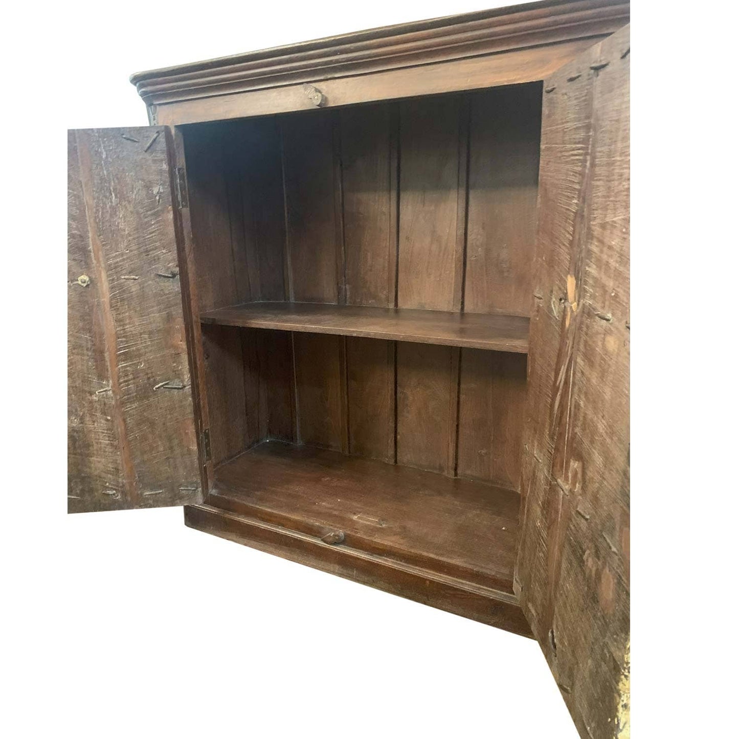 Wooden cabinet with open doors on a white background