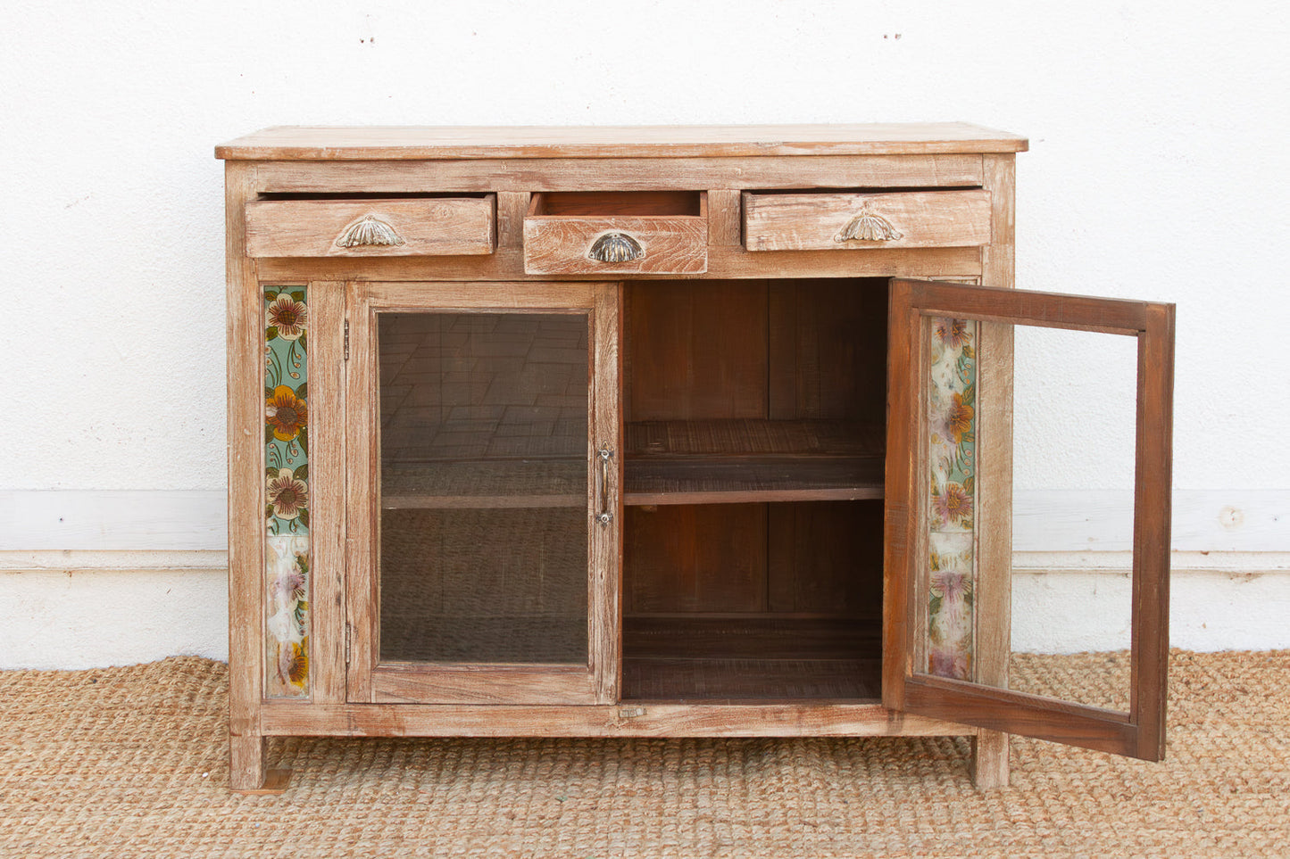 Antique buffet cabinet side profile with carved wood and glass panels