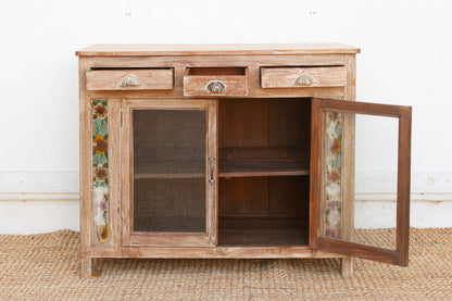 Antique buffet cabinet side profile with carved wood and glass panels