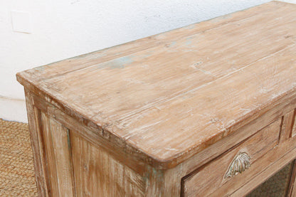 Reverse glass painted buffet cabinet showing rich wood grain and patina