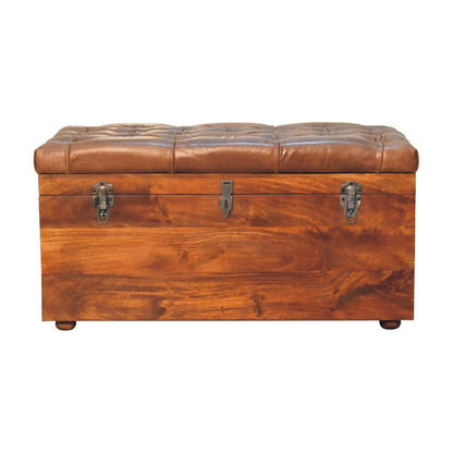 Buffalo Hide Chestnut Storage Trunk with button tufting and wooden base for elegant storage.