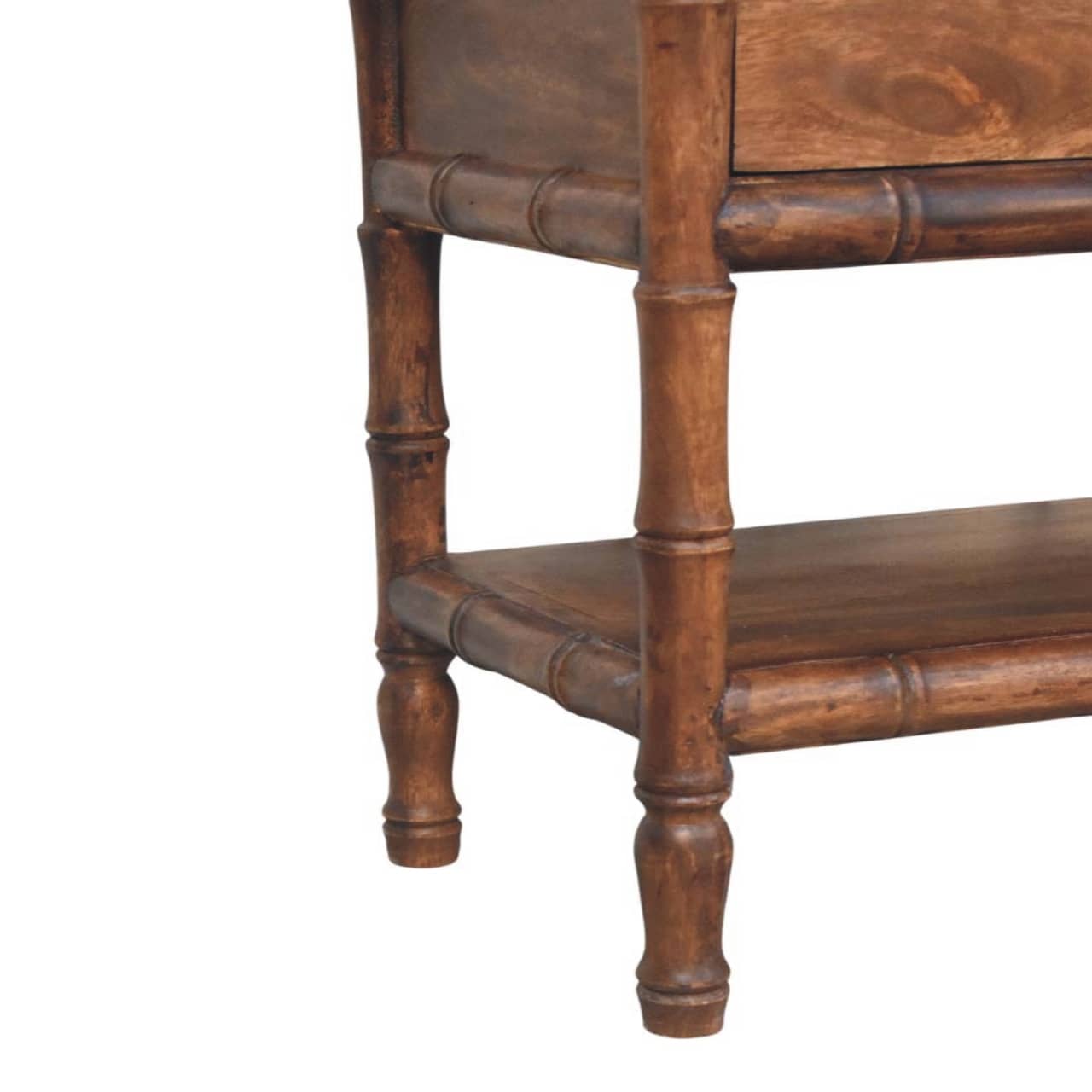 Close-up view of the Bamboo carved storage bench showcasing intricate bamboo-style carvings and warm roasted almond finish.
