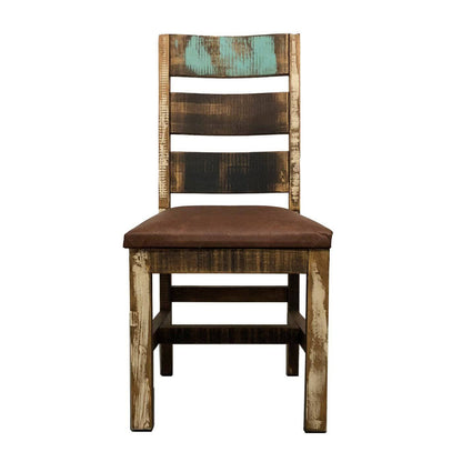 A rustic wooden ladder-back dining chair with a distressed finish, featuring a brown upholstered seat cushion and a backrest with patches of turquoise and dark brown wood.