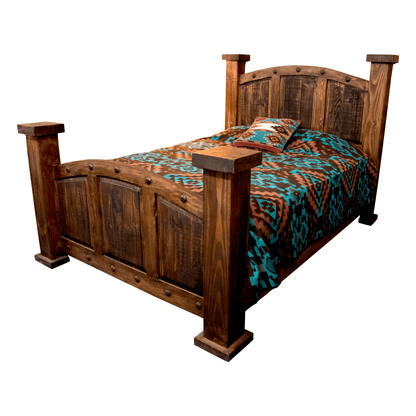 A rustic dark brown wooden bed frame with a curved headboard and footboard, styled with a colorful southwestern patterned comforter and a matching pillow, isolated on a white background.