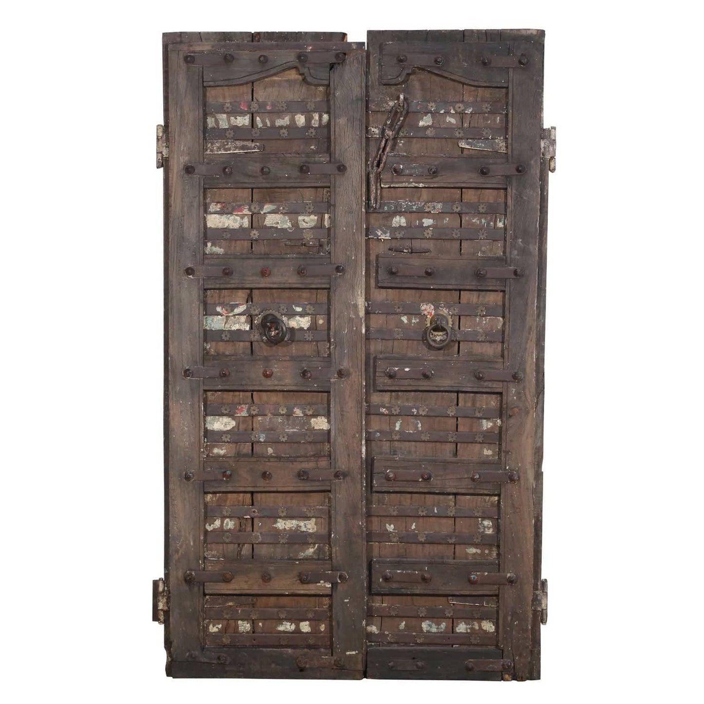 Large wooden door with metal reinforcements on a white background