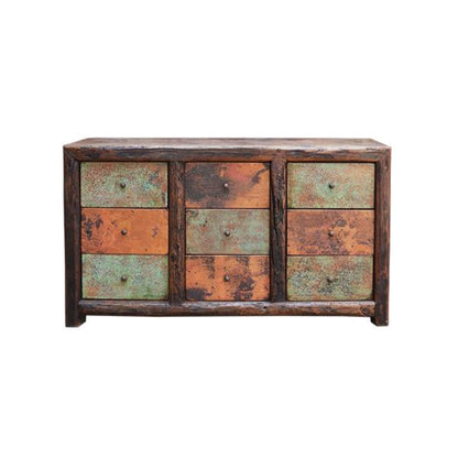 Rustic wooden dresser with multicolored drawers on a white background