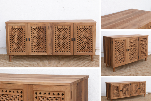 Wooden cabinet with intricate carvings on a white background
