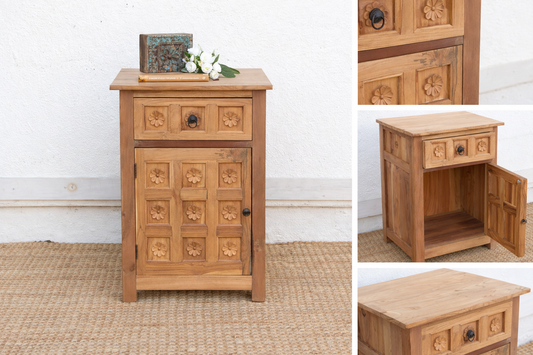 Wooden side table with floral arrangement on a white background