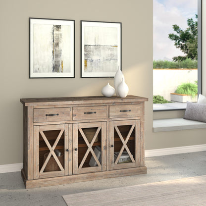 Wooden sideboard with glass doors in a room with abstract art and a window view.